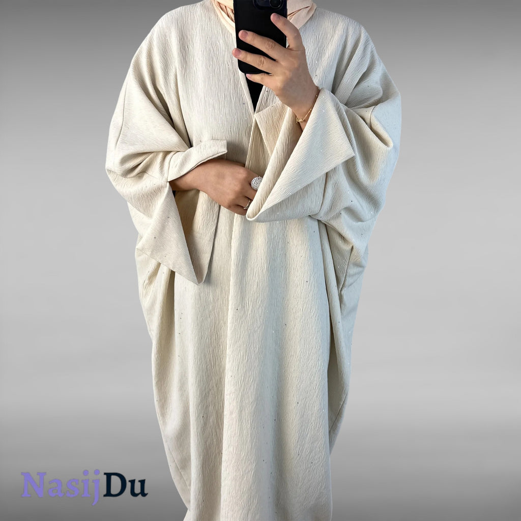 Abaya Hiver 2024 en Poudre Brillante Dorée